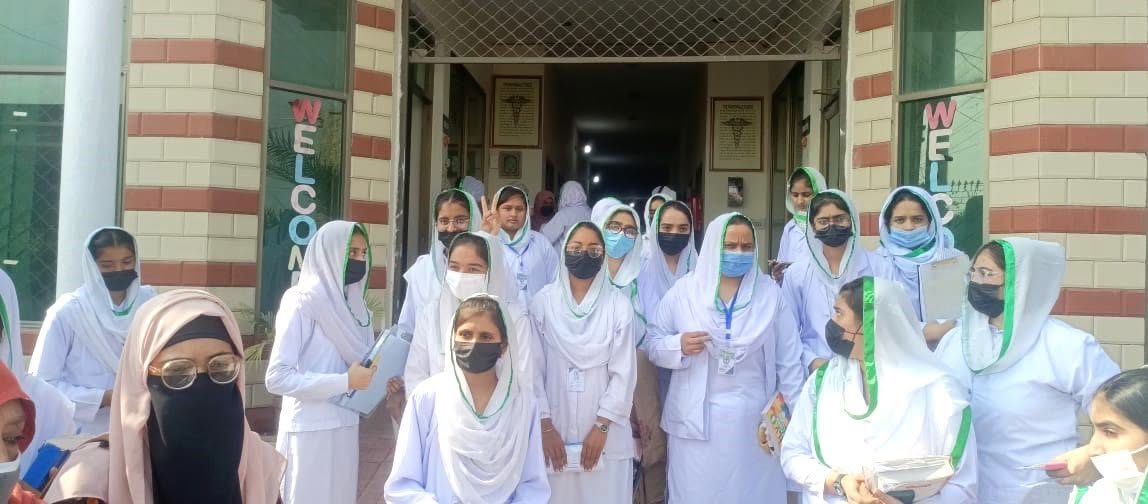 Students at campus entrance